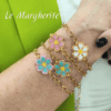 Bracciali margherite di perline fatte a mano con catena in acciaio indossati